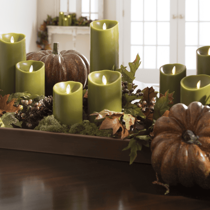 Fall candle decorating ideas using faux greenery, tray & pumpkins