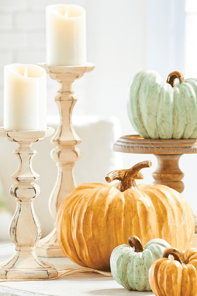 Fall candle decorating ideas using candle stands, pumpkins