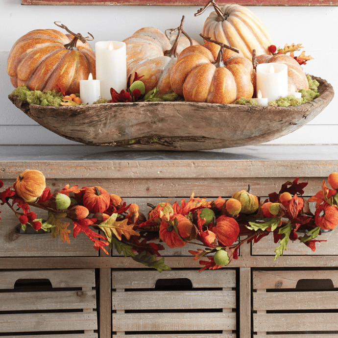 Fall candle decorating ideas using a dough bowl on a sideboard