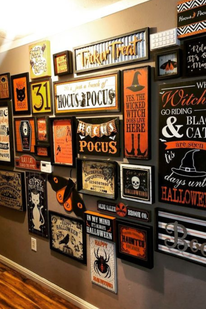 Cute ways to decorate for Halloween using a Halloween wall art gallery in a hallway