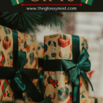 Stacks of Christmas gifts wrapped in festive paper with dark green ribbons. The image has the text "How to Plan Christmas Gifts" and a website link, perfect for all your Christmas gift planning needs.