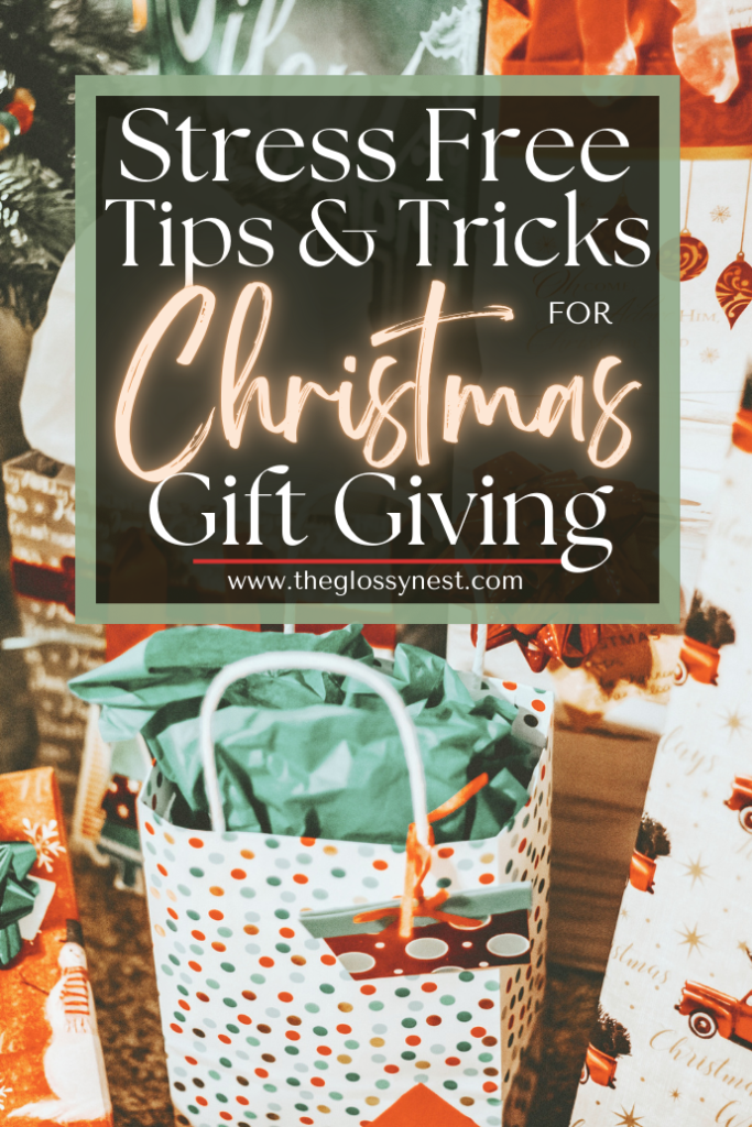 Festive image featuring a gift bag surrounded by Christmas presents, with a holiday-themed backdrop. A text overlay reads, "Stress-Free Tips & Tricks for Christmas Gift Giving."