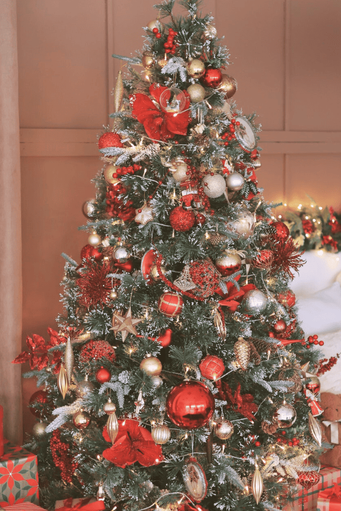 christmas tree with red, gold ornaments