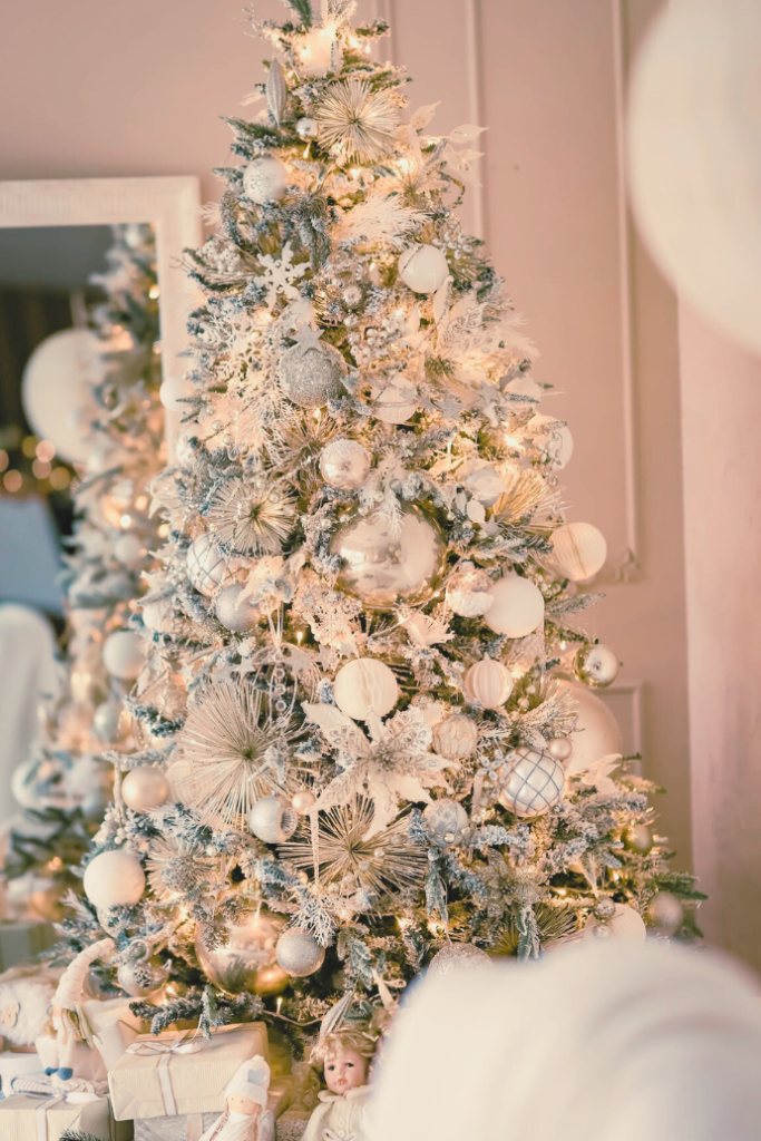 flocked Christmas tree with white ornaments