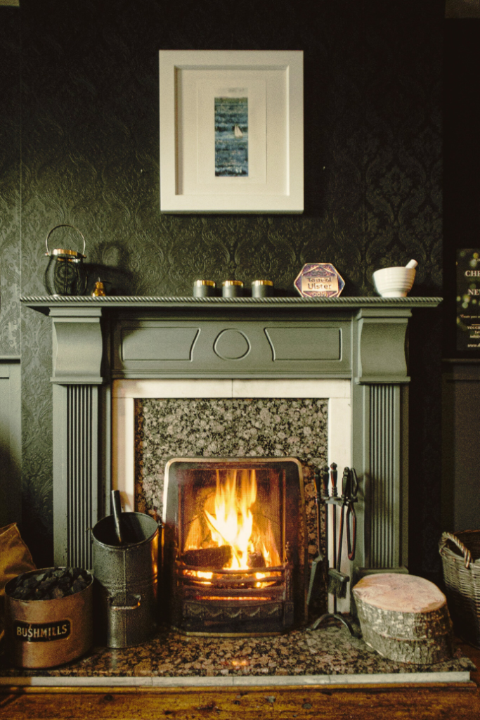 fireplace with mantel decor, artwork