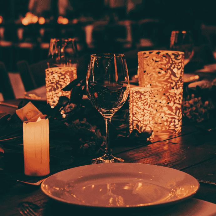 wedding table centerpiece with flameless candles, cut out lanterns