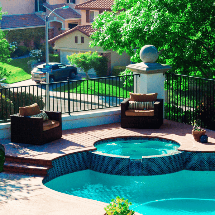 multi level inground pool deck withe seating areas, potted plants