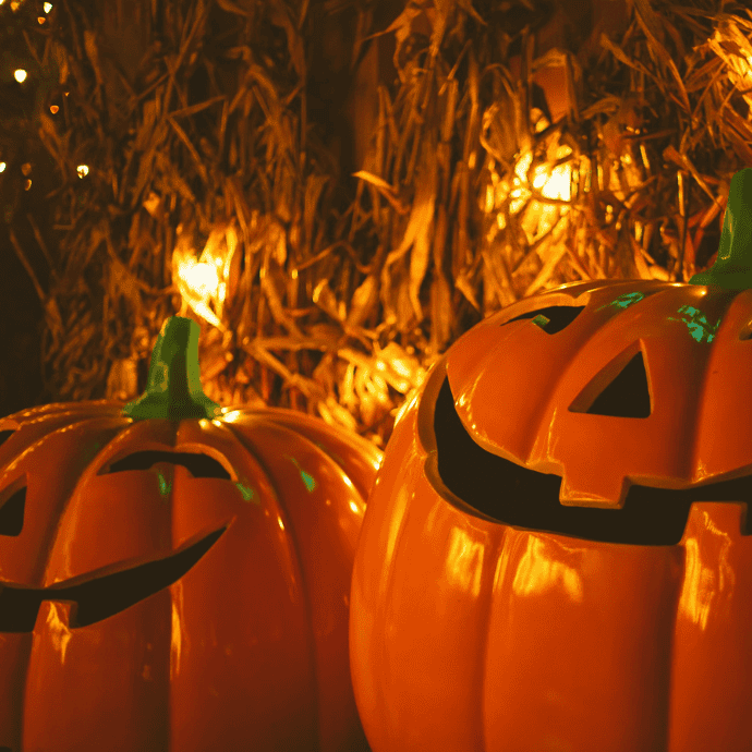 laughing halloween jack-o-lantern figurines outdoor at night