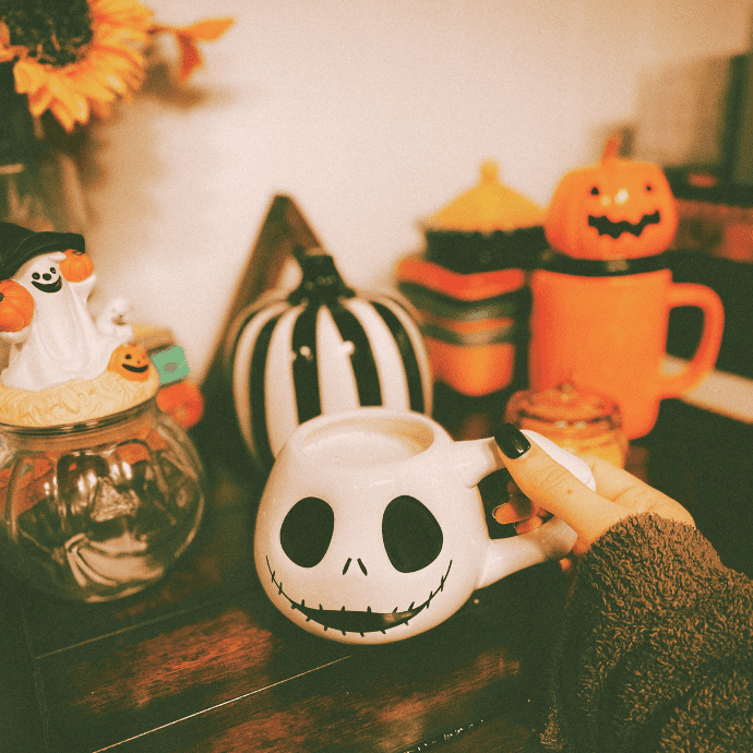 cute halloween mug near coffee bar