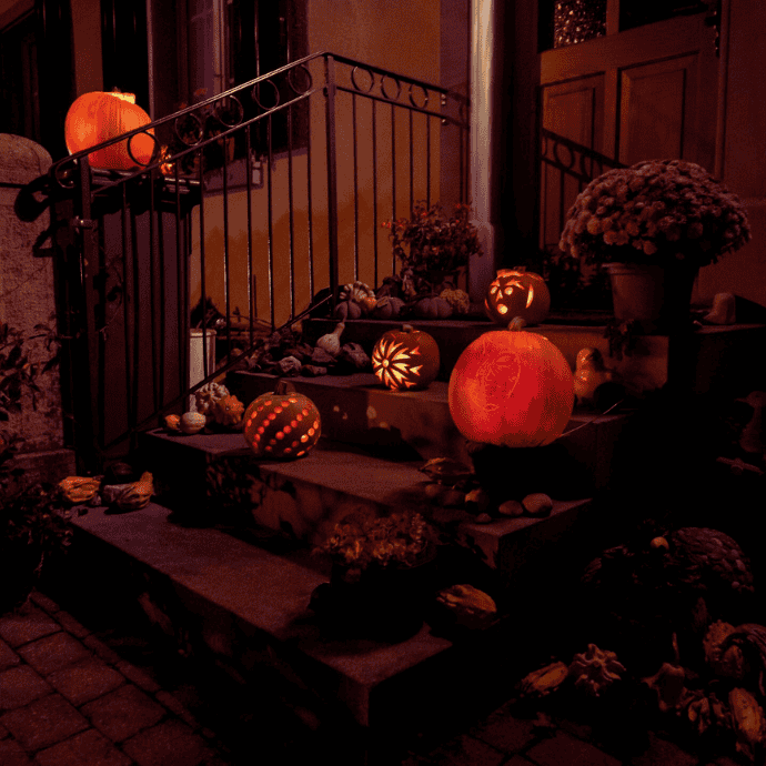 halloween front steps with jack-o-lanterns, mums, gourds