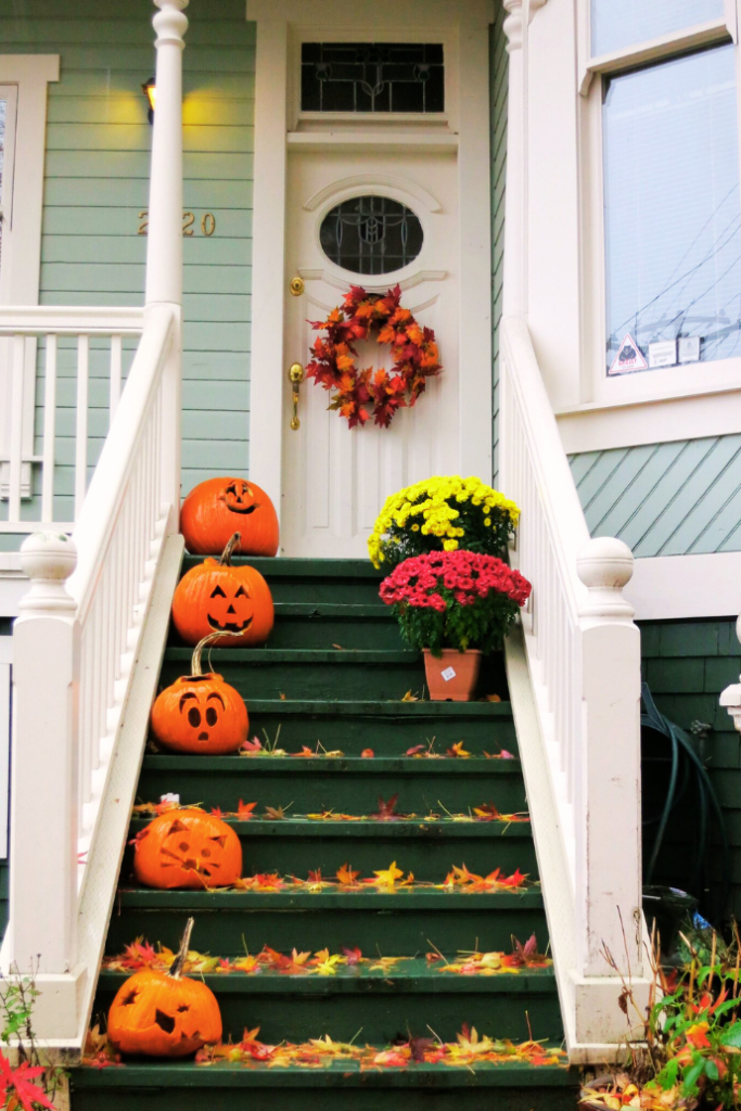 front porch steps with halloween jack-o-lanterns