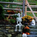 skeleton waving in garden for halloween decor