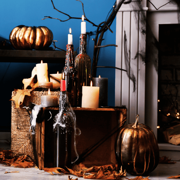 melted candles for halloween by fireplace