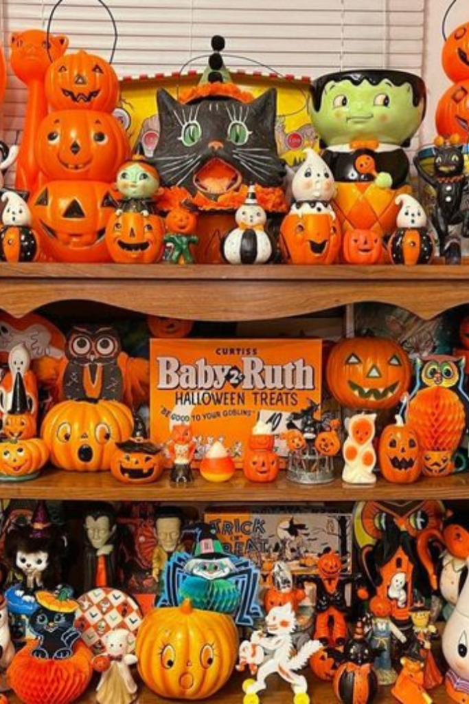 vintage halloween decorations on shelves