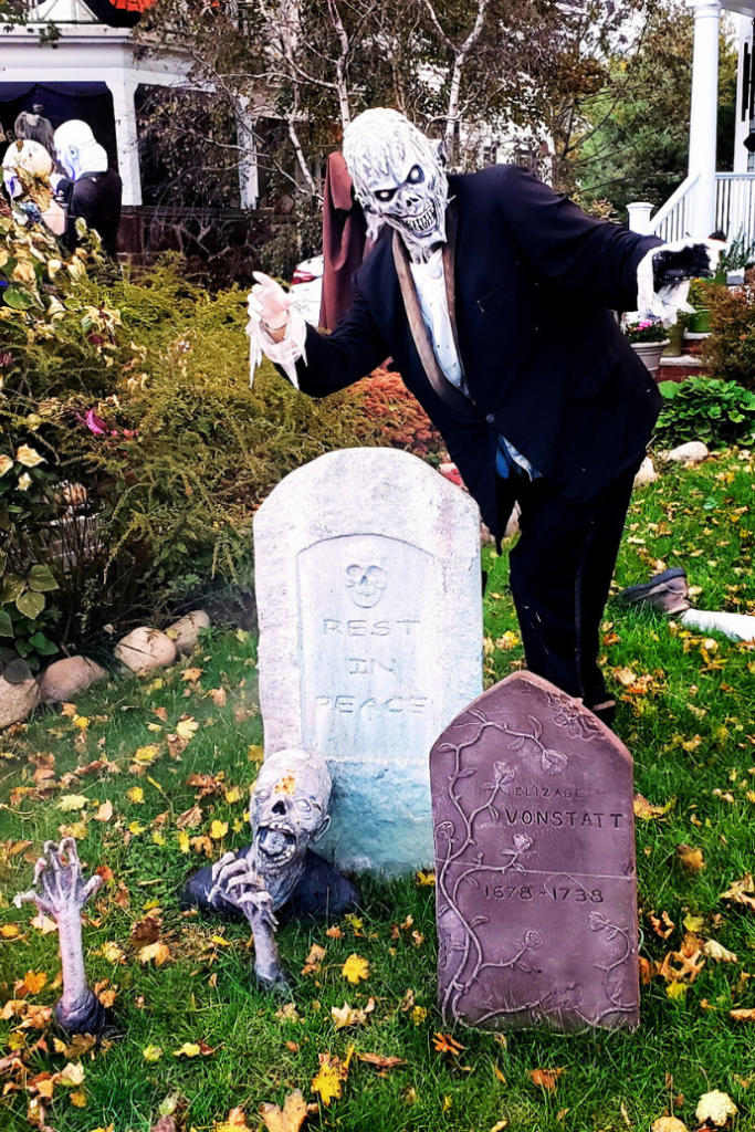 halloween front yard decorations with zombie, tombstones, ground breaker props