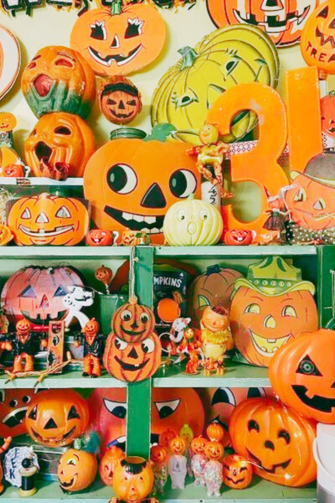 vintage halloween decorations on shelves