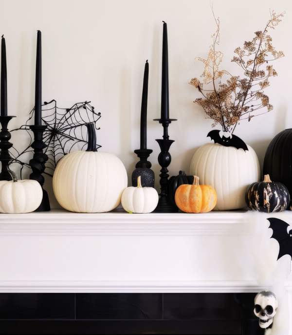 chic halloween mantel with white pumpkins, candlesticks