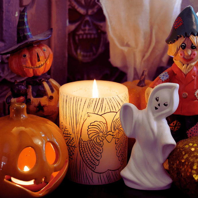 cute halloween decorations with candles, figurines