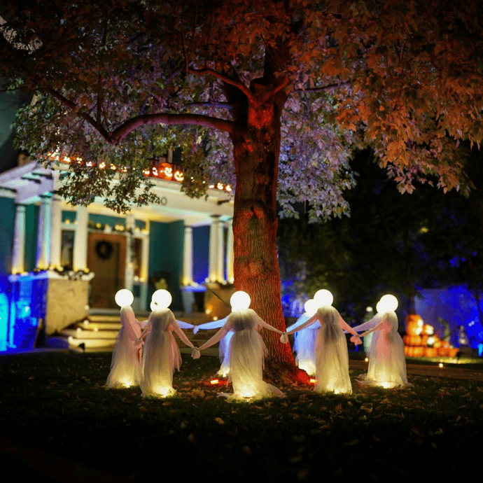 light up ghosts around tree in front yard for halloween