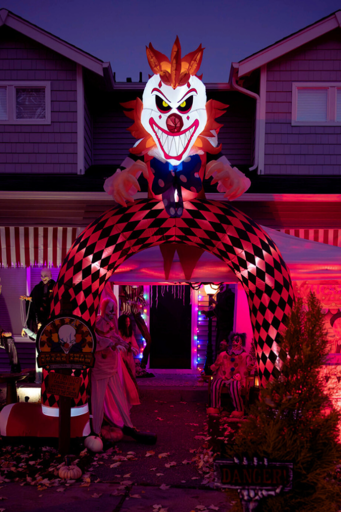 halloween front porch lighting ideas with blow up archway