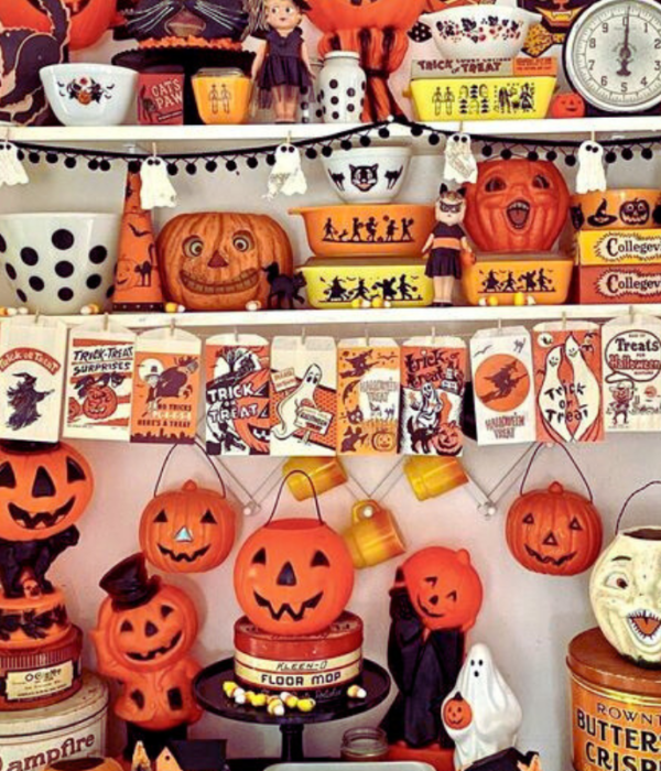 kitchen shelves with retro halloween decorations, cookware, serveware