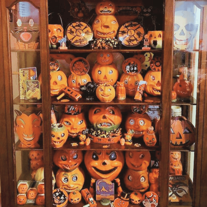 curio cabinet with vintage halloween jack-o-lanterns