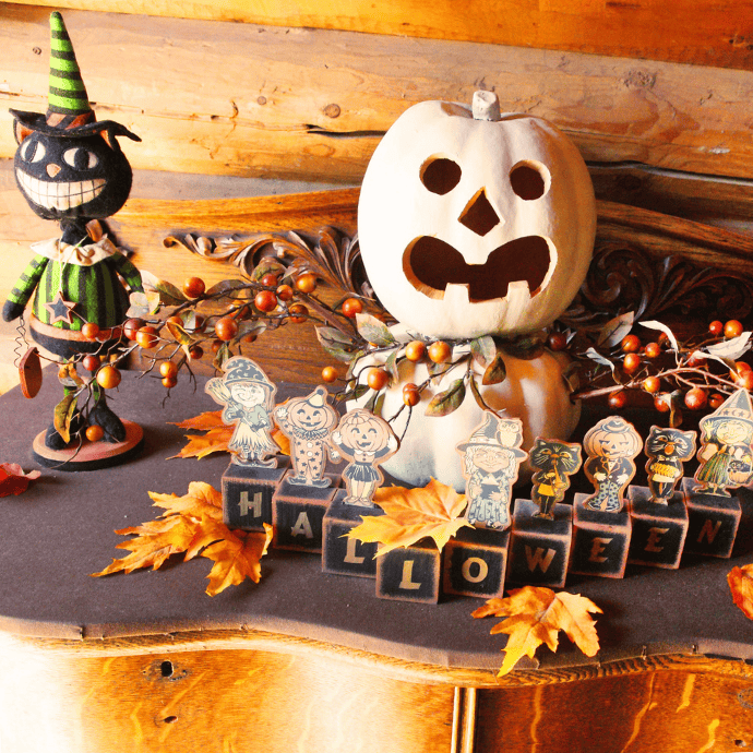 vintage halloween vignette on sideboard