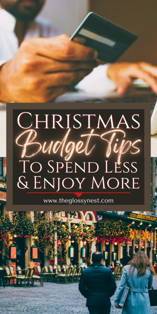 A person using a credit card with the text "Christmas Budget Planning: Tips to Spend Less & Enjoy More" displayed below. The background features a festive street scene adorned with holiday lights and decorations.