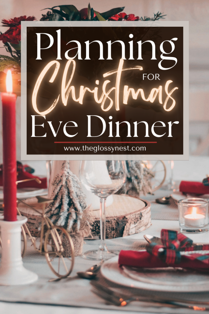 A festive table set for Christmas Eve dinner with red candles, pine decorations, silver cutlery, and glasses. Text overlay reads, "Planning for Christmas Eve Dinner" with a website link to theglossynest.com.