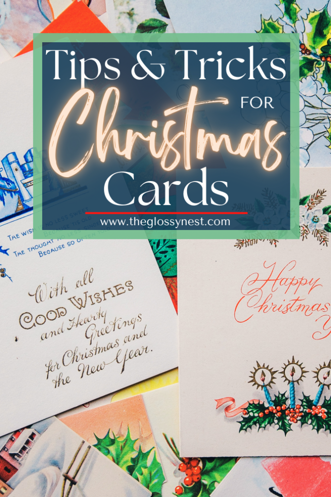 A holiday-themed image displaying several Christmas cards with festive designs and messages. Overlaid text reads "Tips & Tricks for Christmas Cards" with the website "www.theglossynest.com" below.