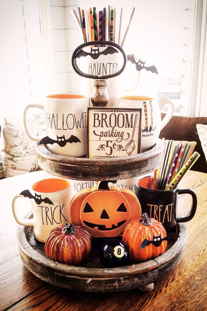 farmhouse tiered tray with Rae Dunn mugs, pumpkins