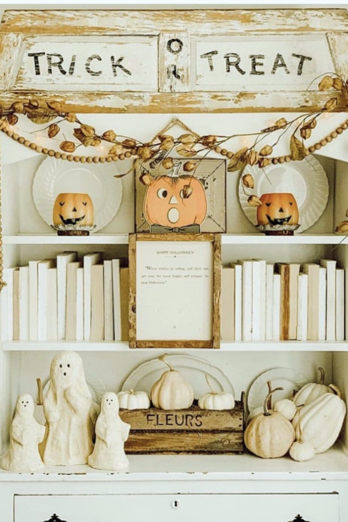 farmhouse halloween shelves decor with trick or treat sign