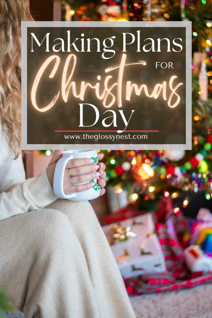 A person holding a mug sits in front of a decorated Christmas tree with colorful lights and ornaments. The image features the text "Making Plans for Christmas Day" from theglossynest.com.