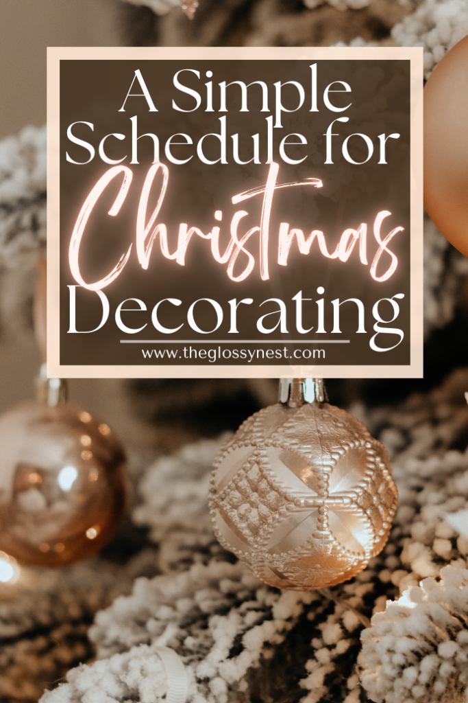 A festive image showing a Christmas tree with ornate baubles. Text overlay reads, "A Simple Schedule for Christmas Decorating" with the website "www.theglossynest.com" below.