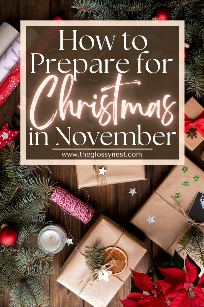 A festive flat lay with wrapped gifts, twine, ornament, pine branches, and poinsettia leaves on a wooden table. Overlay text reads, "How to Prepare for Christmas in November," with a website URL below it.